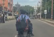 Four students on one bike