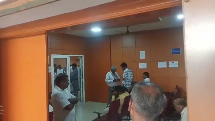 Coimbatore DVAC officials inspecting sub registrar office documents corruption raid scene