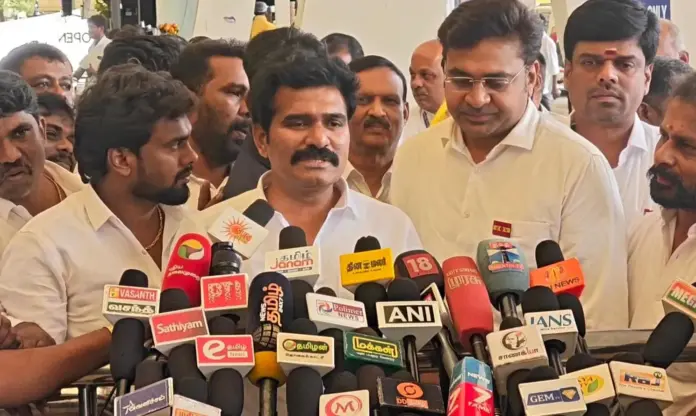 Minister Nirmal Kumar addressing media at Coimbatore Airport.