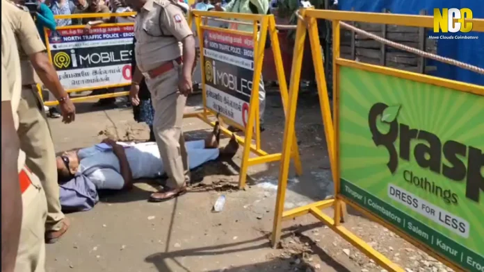 A visually impaired man lies on the road attempting to meet Chief Minister Vijay